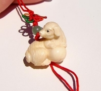 Carved Mammoth Ivory Playing Dog Bead, 22mm