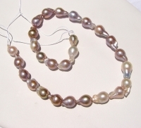 A+ Lilac Fireball Baroque Pearls, 10-11mm